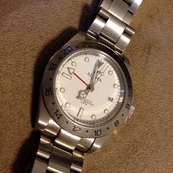 Alpha explorer GMT white dial, SOLD | WatchCharts Marketplace