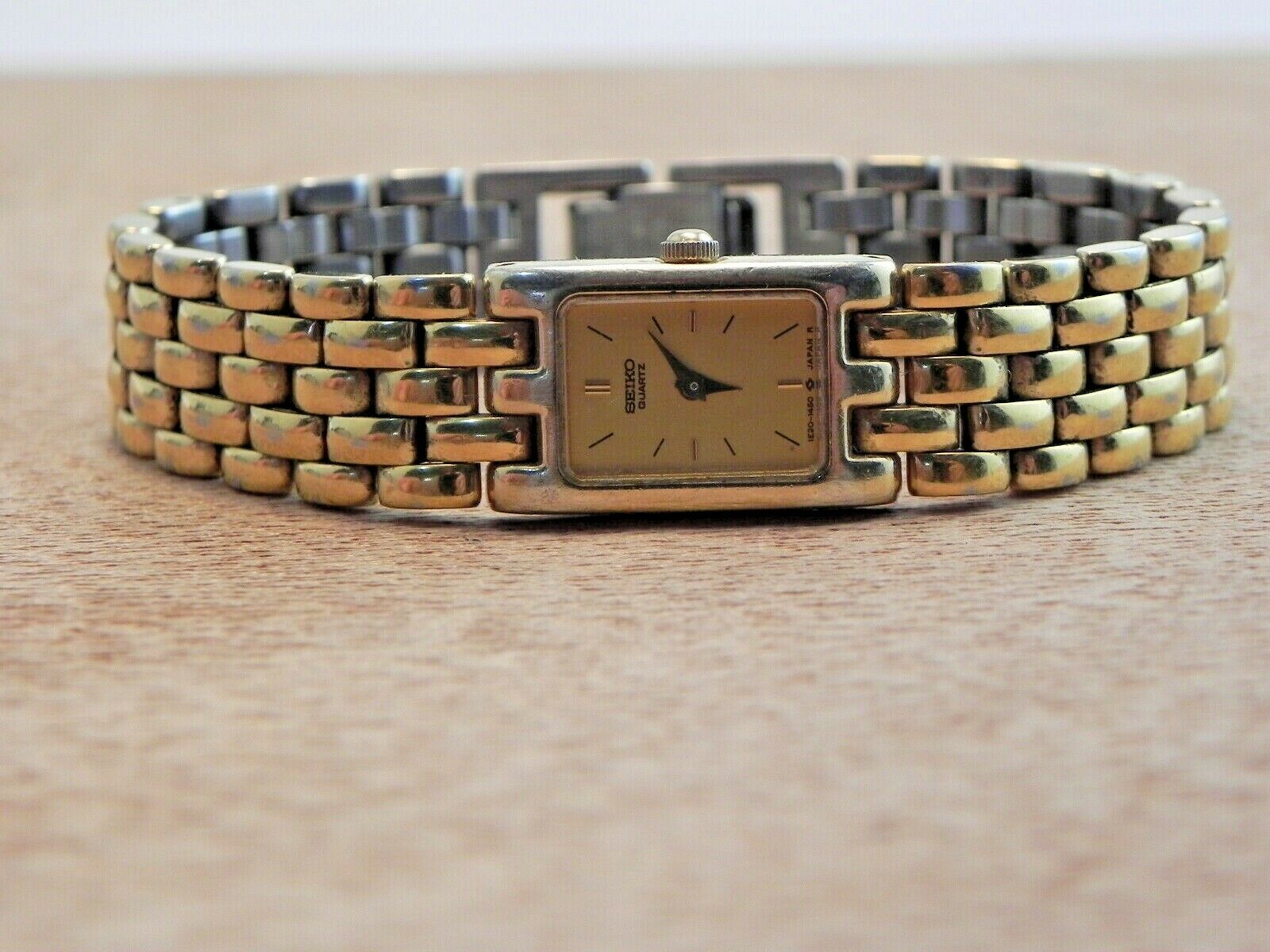 Woman's Seiko 1E20-5839 Dress Wrist Watch-New Battery-Gold Tone