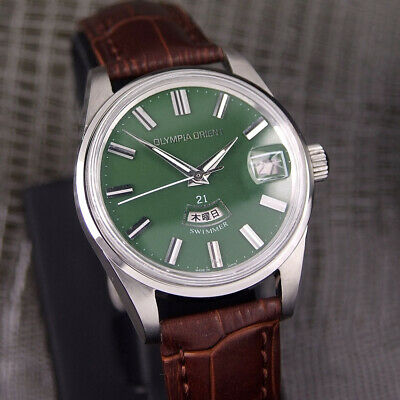 Authentic OLYMPIA ORIENT WEEKLY SWIMMER Day Date Green Dial Manual