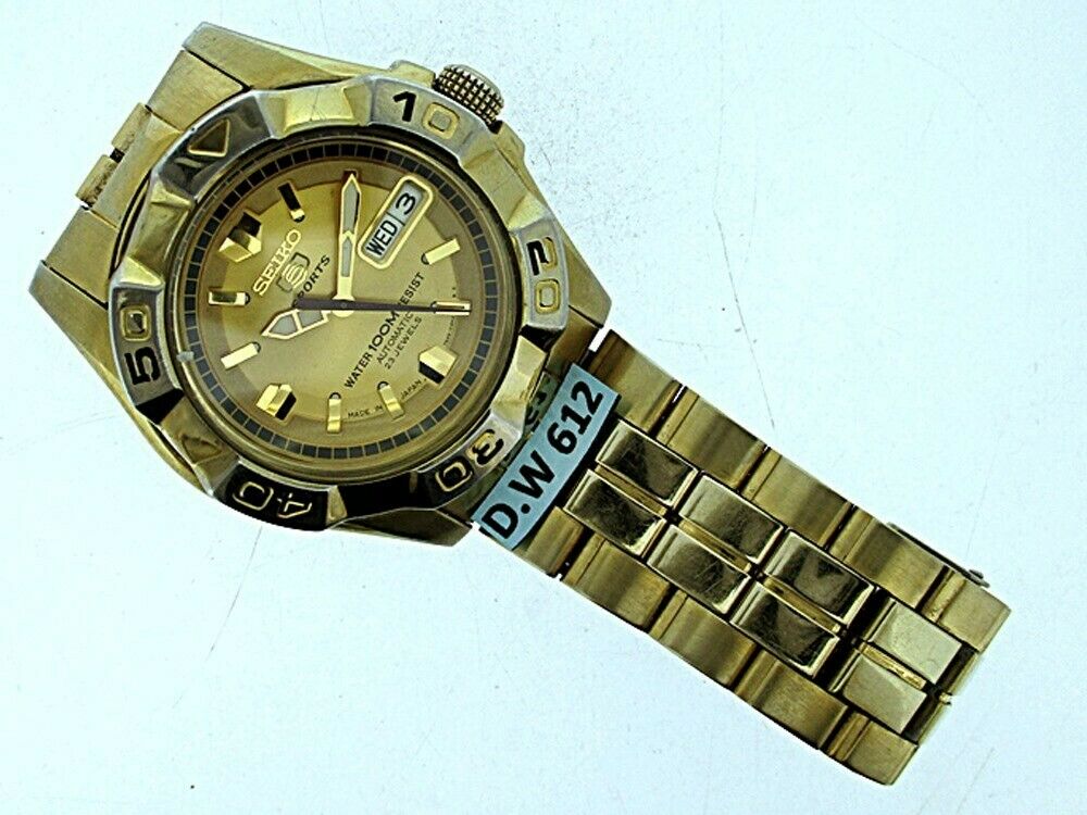 CLASSIC SEIKO 7S36 02L0 MENS SEE THRU AUTOMATIC DAY DATE GOLD