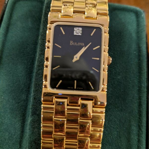 Bulova Gold Tone Black Dial Quartz T7 Watch with Diamond NIB