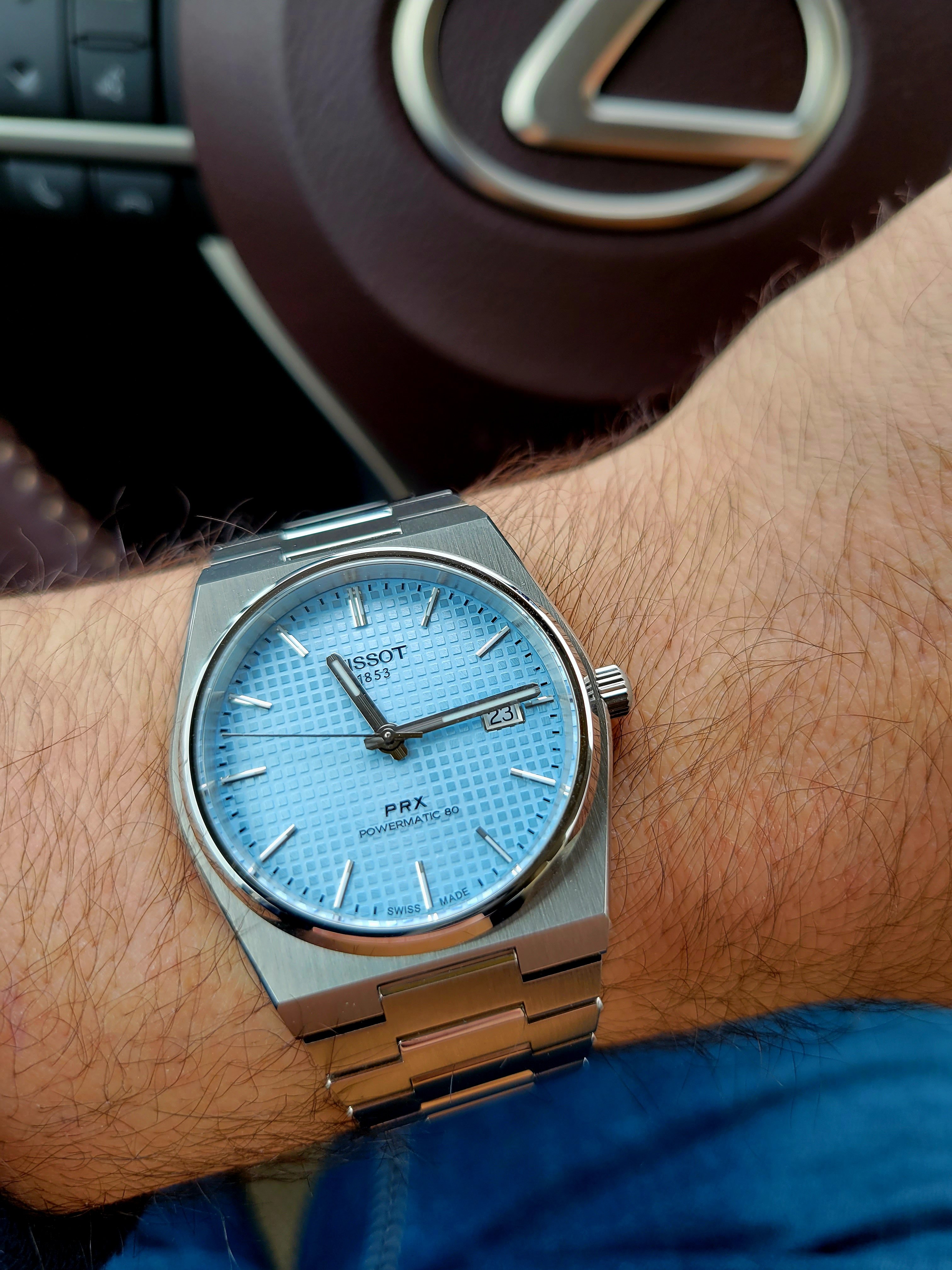 600 USD F.S. Tissot PRX ice blue dial plus white oem rubber strap