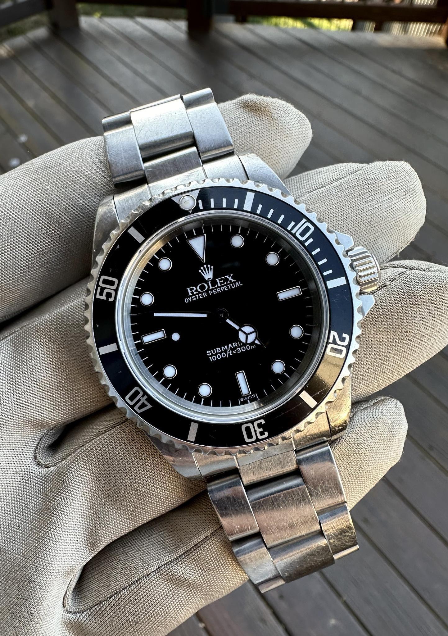 Rolex 14060 swiss only sale dial