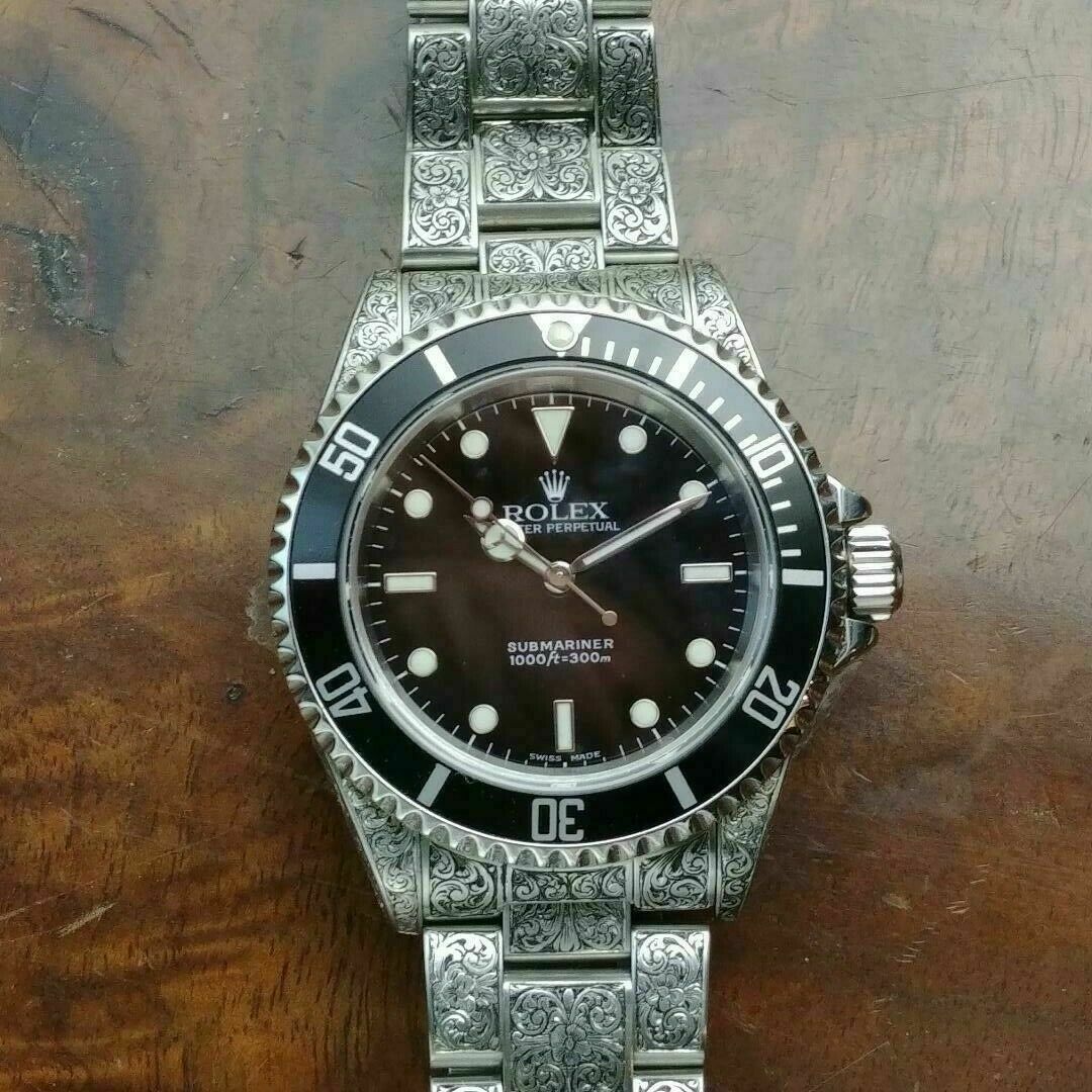 Hand engraved sale rolex submariner price