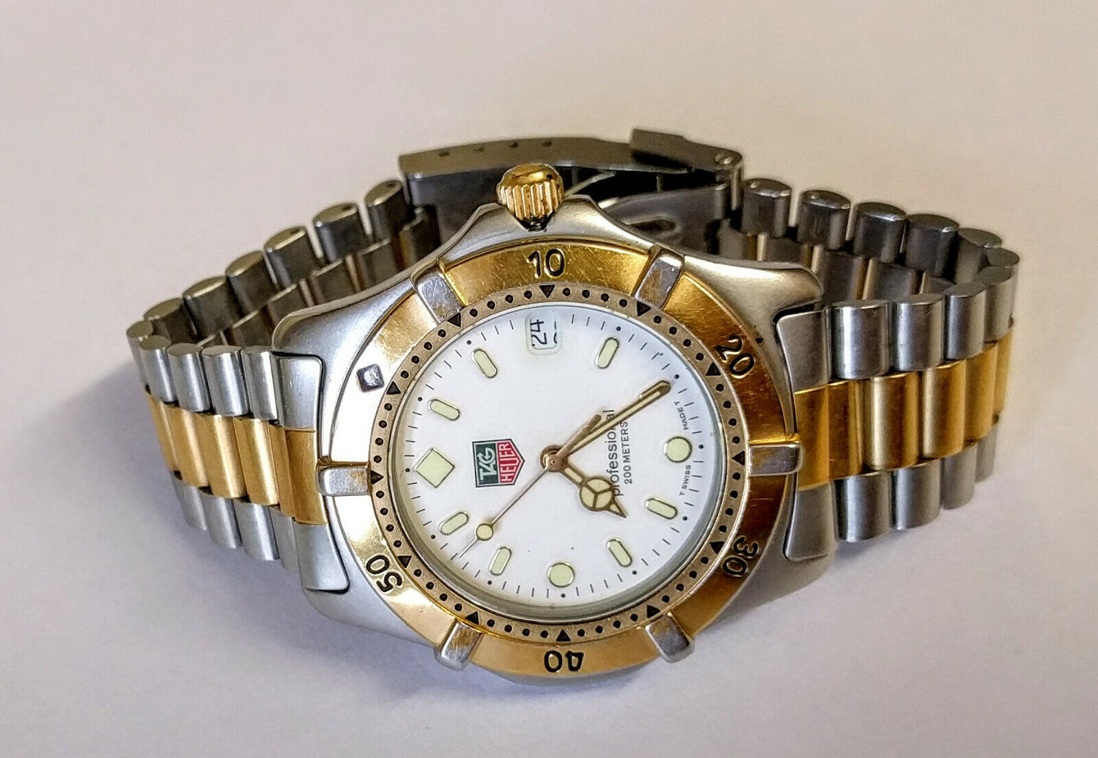 TAG Heuer Professional Quartz Watch WE 1122 R Battery leaked