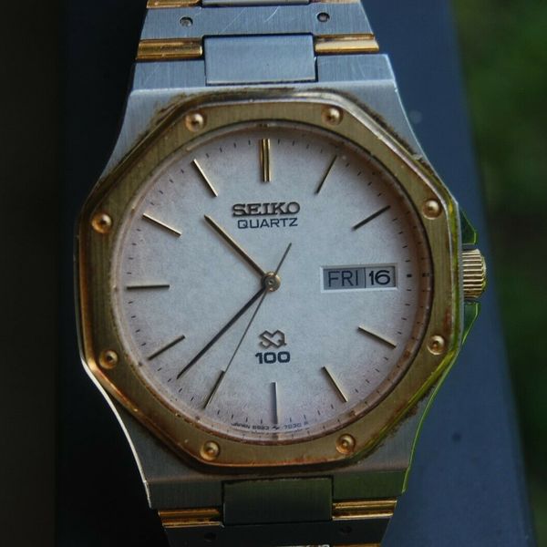 Vintage SEIKO 6923-7020 date steel/gold tone original band | WatchCharts