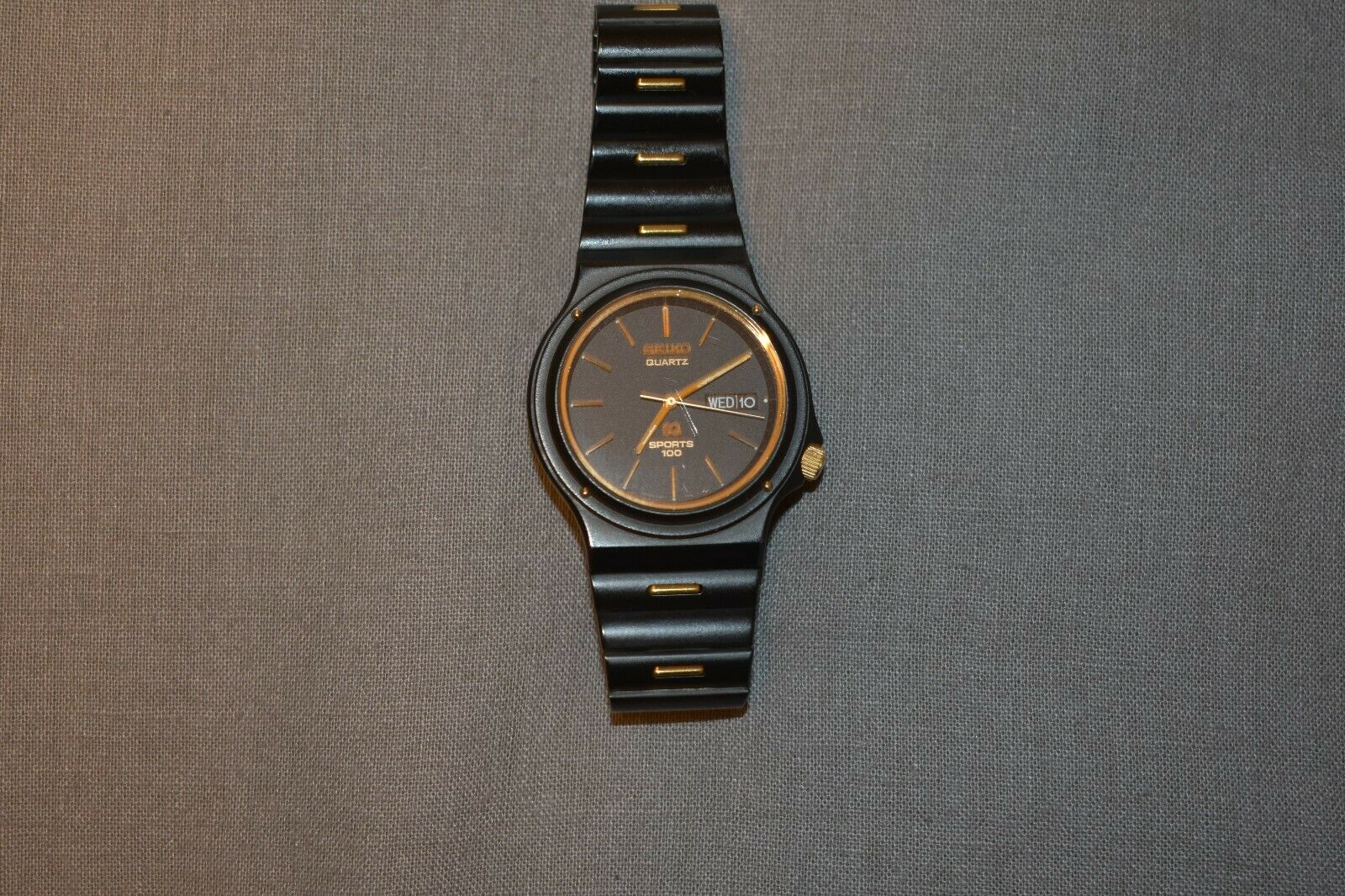Vintage Seiko Quartz Sports 100 Black and Gold Men's Watch
