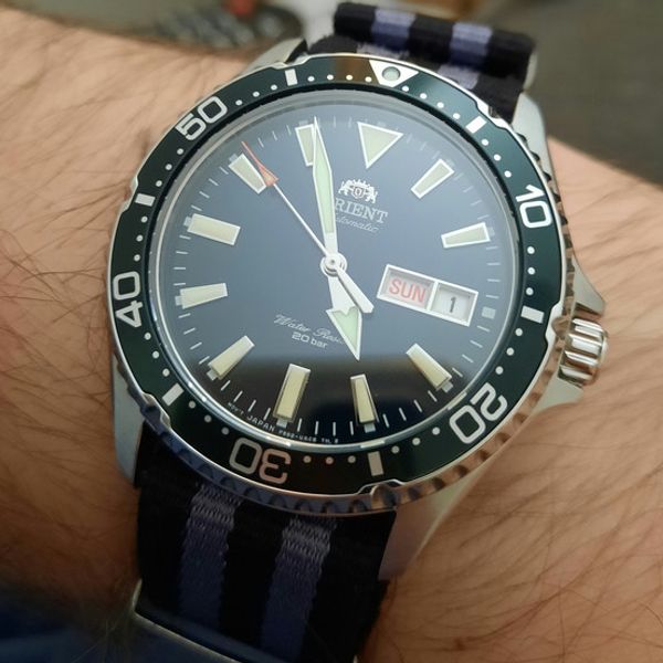 Orient Kamasu green/teal 130GBP (UK) WatchCharts