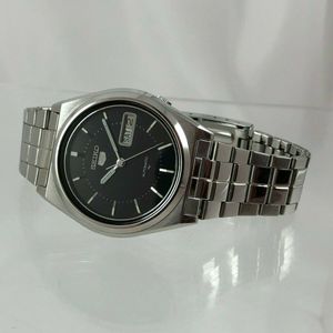 Vintage Seiko 5 7009-8761 Automatic Stainless Steel Black Dial Wristwatch |  WatchCharts