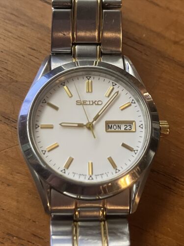 Seiko 7N43 9070 White Face w Gold Accents Watch WatchCharts