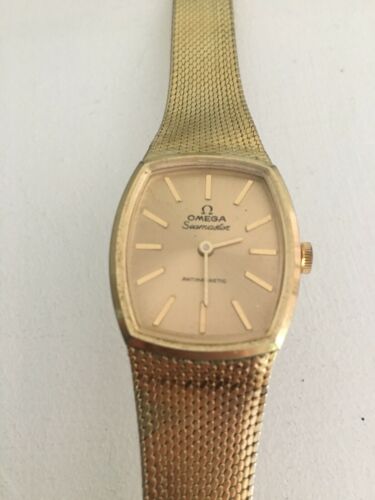 omega seamaster antimagnetic swiss made 18k 0.750