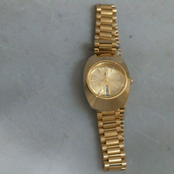 Domino watch 22k gold price sale