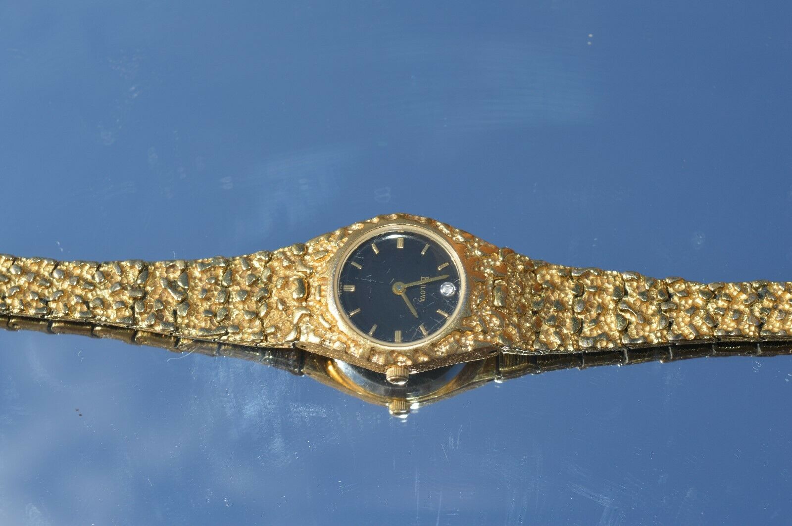 Bulova gold best sale nugget watch