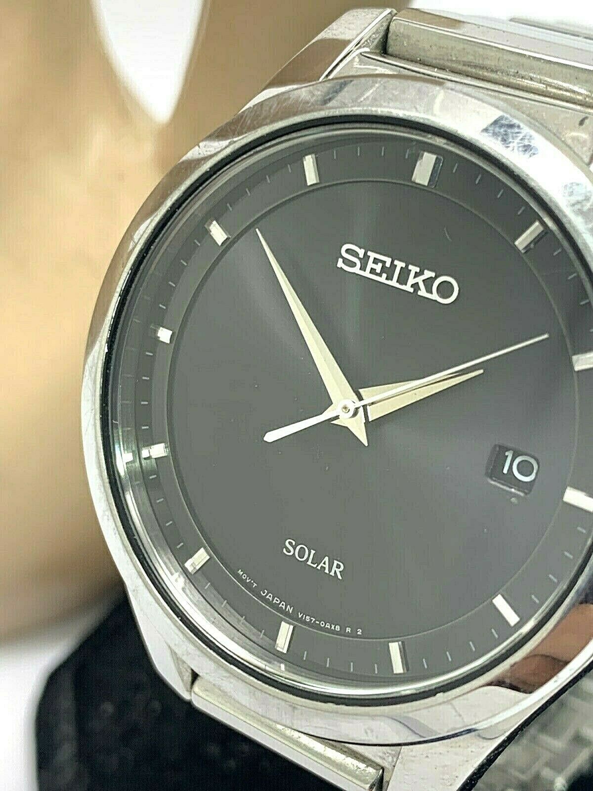 Seiko Solar Black Dial Date Silver Tone Stainless Steel Men's