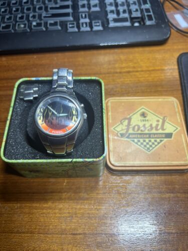 Fossil big tic online flame watch