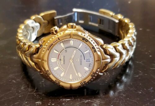 Seiko Kinetic 3M22 0B99 Gold Toned Stainless Steel Sports 100