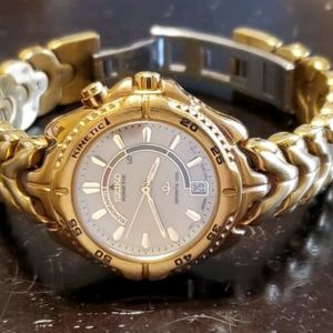 Seiko Kinetic 3M22-0B99 Gold Toned Stainless Steel Sports 100 Women's Watch  | WatchCharts