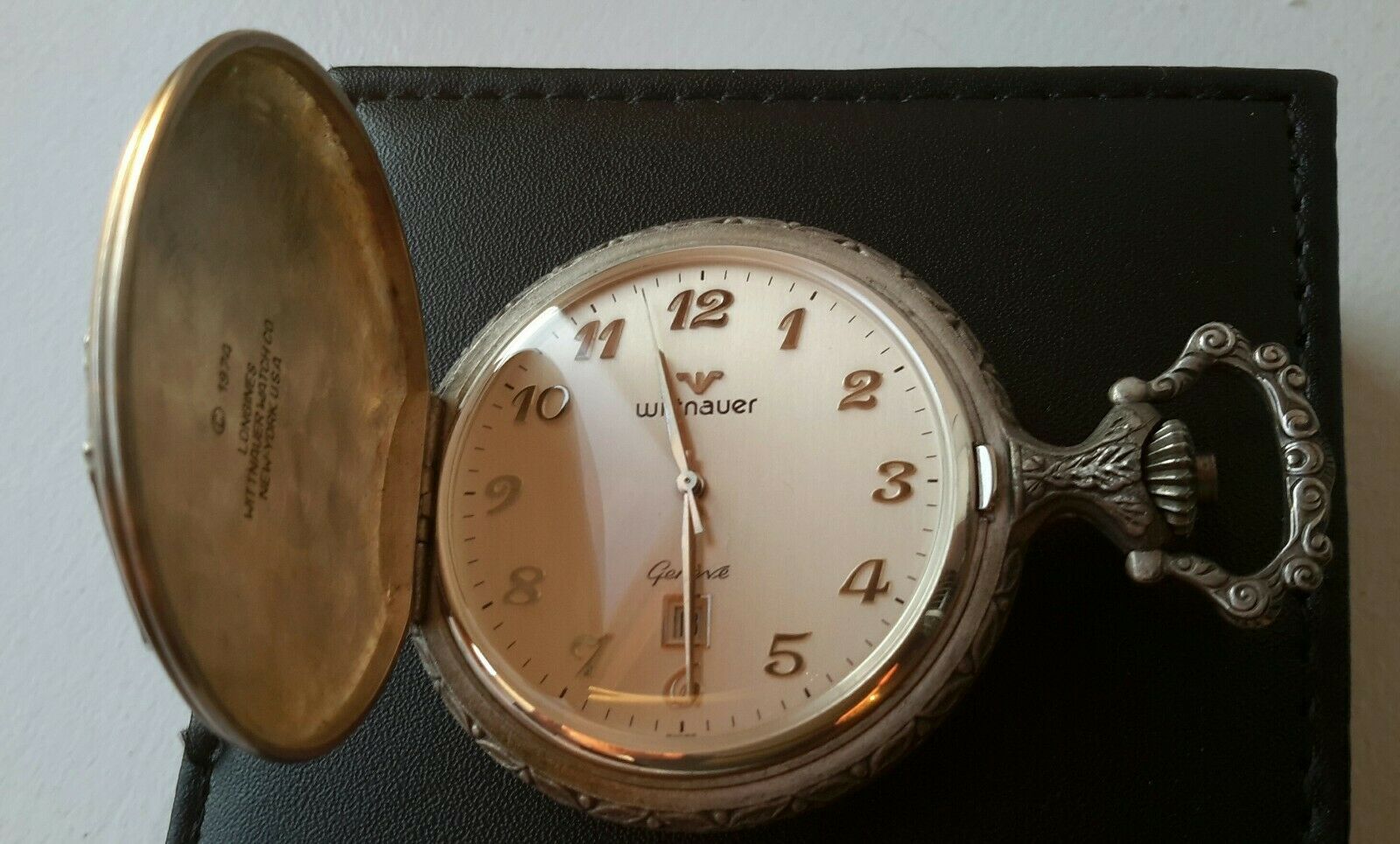 pocket watch with date window