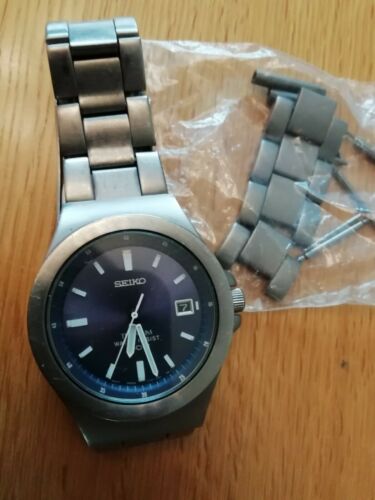 Seiko V732-0P30 Titanium Watch 100M Water Resist