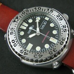 SEIKO 7N36-0AF0 200m Diver Quartz Date Sawtooth Tuna Nice Collections |  WatchCharts