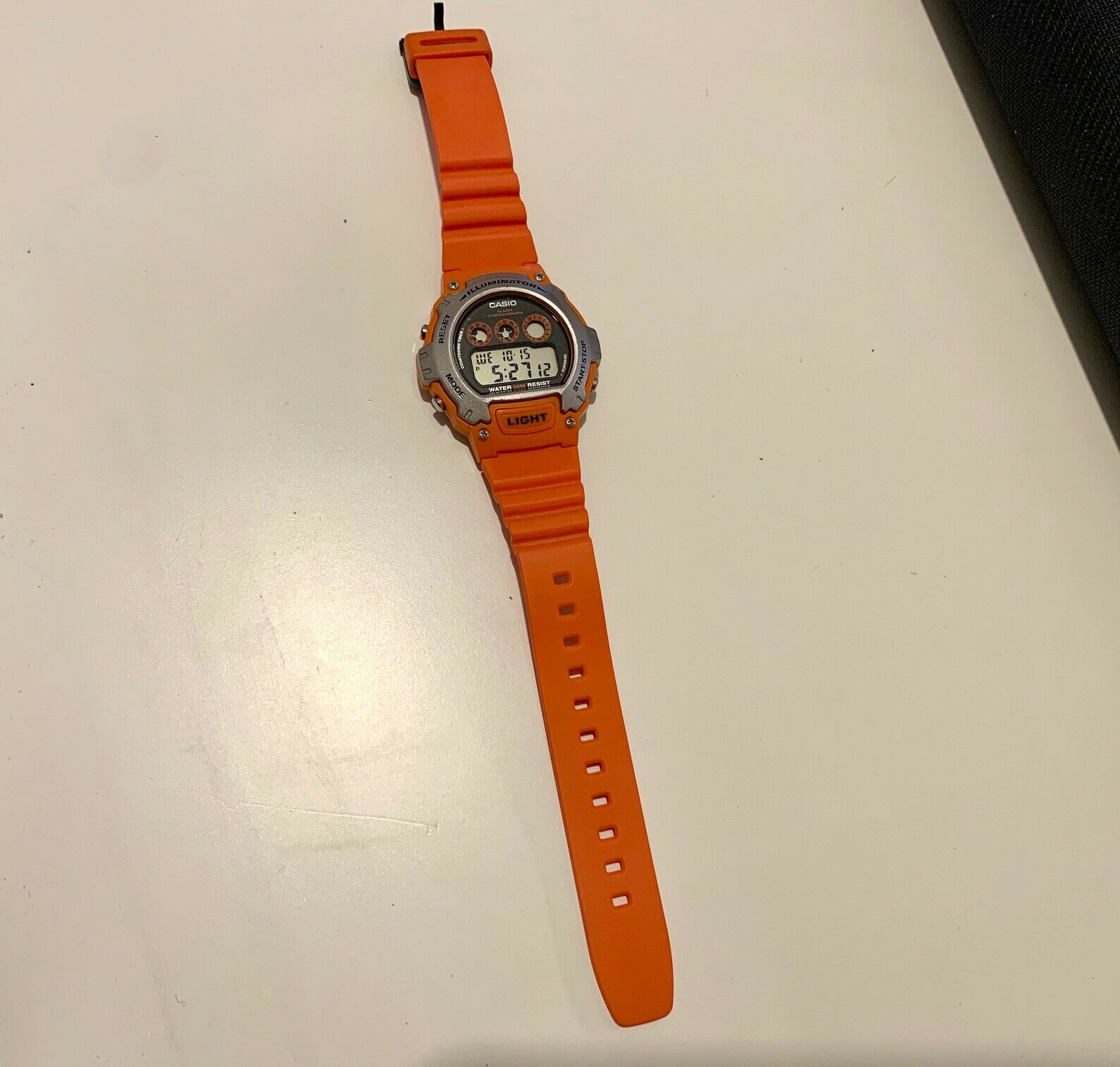 casio men's illuminator lcd orange resin strap watch