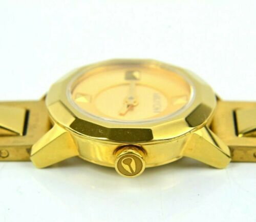 Nixon store Women's watch. Gold face. Wrist Rockit, The mini B