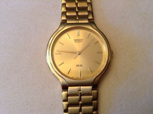 Vintage Seiko SX Analog Quartz Watch Gold V701-6K00 JDM Japan | WatchCharts