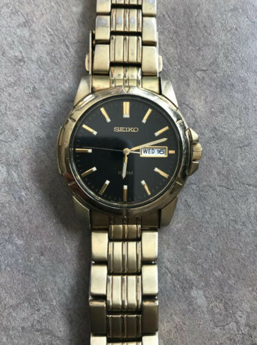 Seiko Men s Gold Tone Day Date Watch 7N43 0AZ0 Up to 7.75