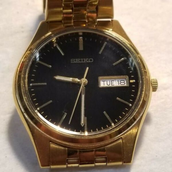 Mans Seiko 7N43-9046 Day Date Wrist Watch | WatchCharts