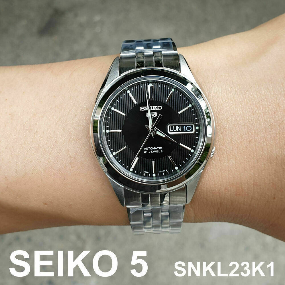 Seiko SNKL23 Automatic Day-Date Black Dial Stainless Steel Mens SNKL23K1 | WatchCharts