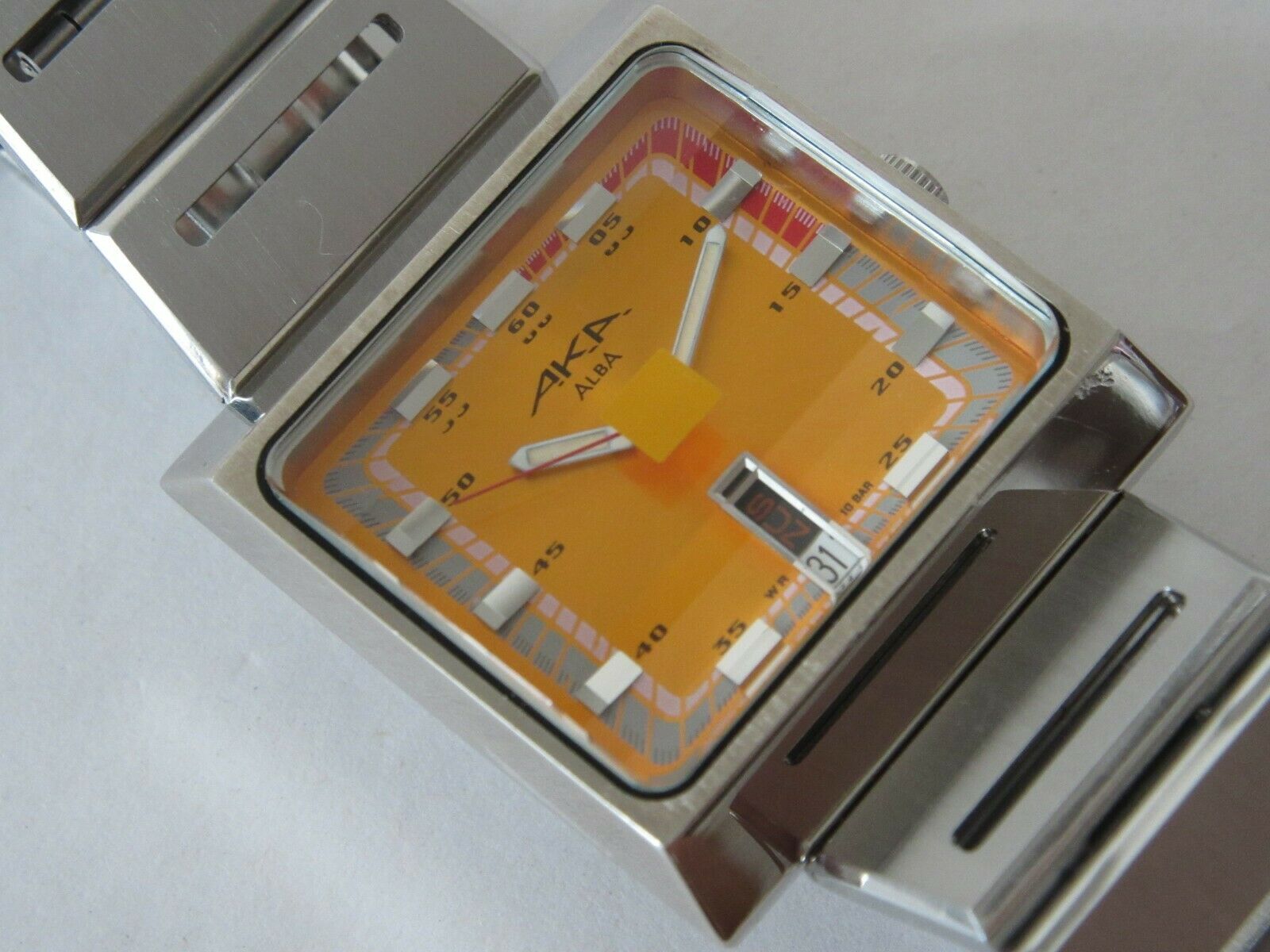 SEIKO ALBA AKA V733-5A40 ORANGE SQUARE WATCH | WatchCharts Marketplace