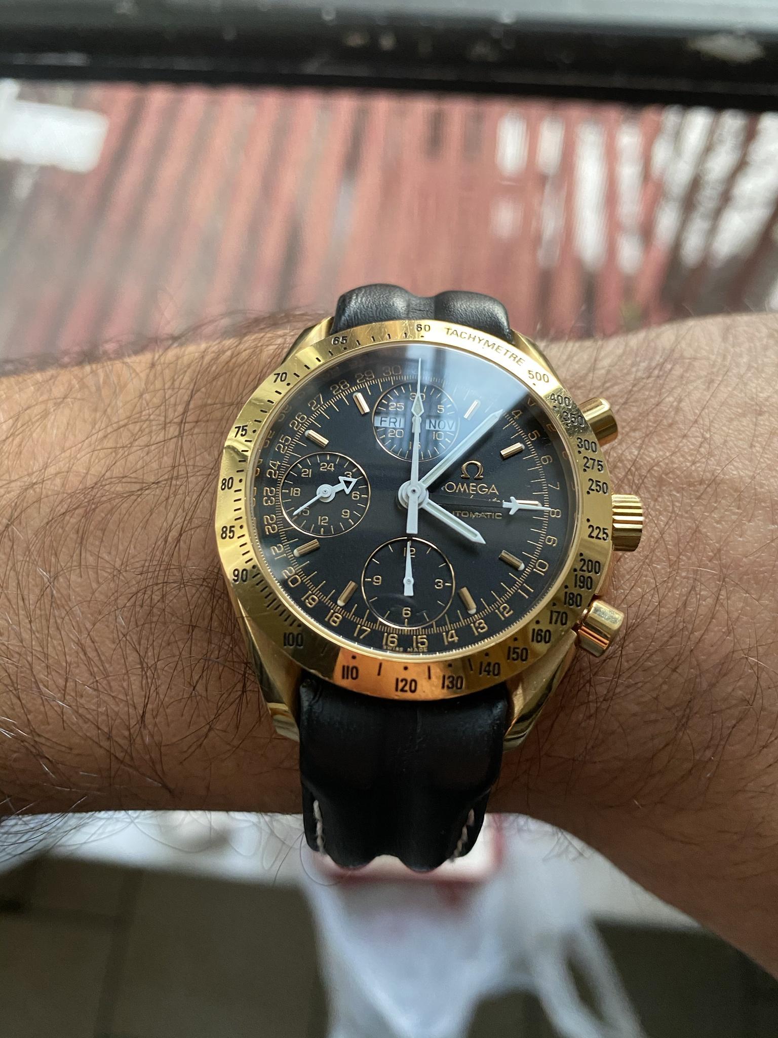 omega speedmaster day date gold