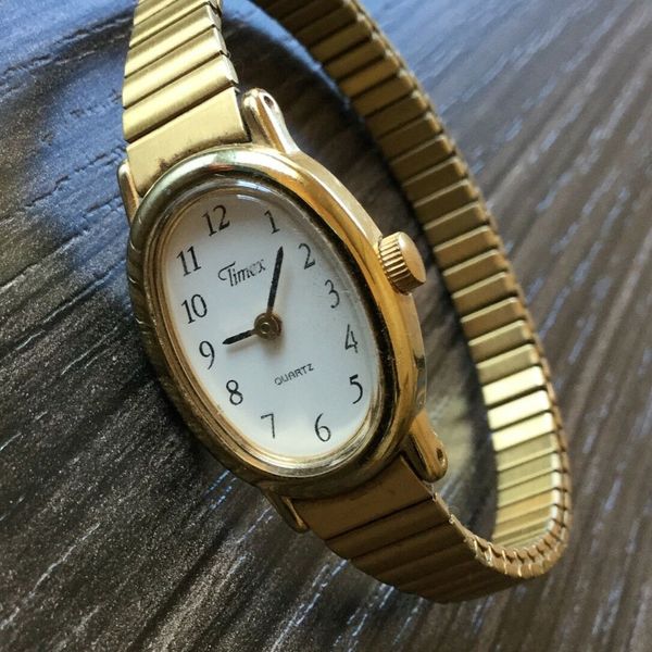 Timex selling Women's watch. Unique gold bevel. 377 BA CELL, 78