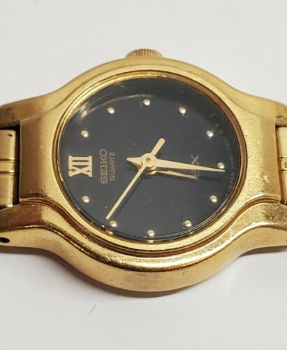 VINTAGE SEIKO SX WOMEN'S GOLD TONE BLACK DIAL QUARTZ