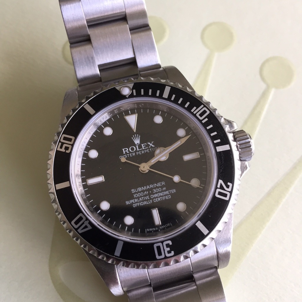 Rolex discount 14060m cosc