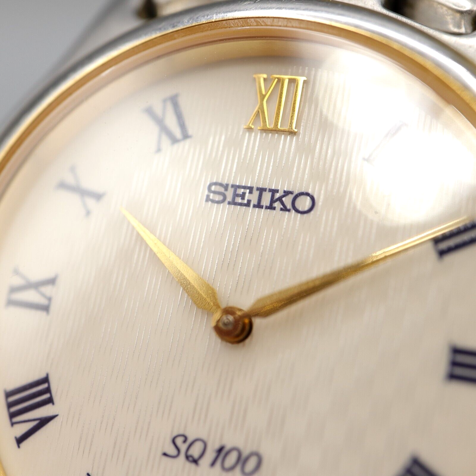 Seiko SQ 100 Mens Date Watch Two Tone Texture Dial 7N49-0040