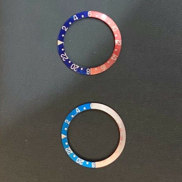 GENUINE ROLEX BEZELS FOR A SUBMARINER AND GMTMASTER, LOT OF 4