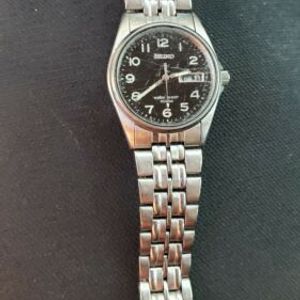 Seiko 7N43-8329 - Men's Stainless Steel Watch Water Resistant Black Face |  WatchCharts