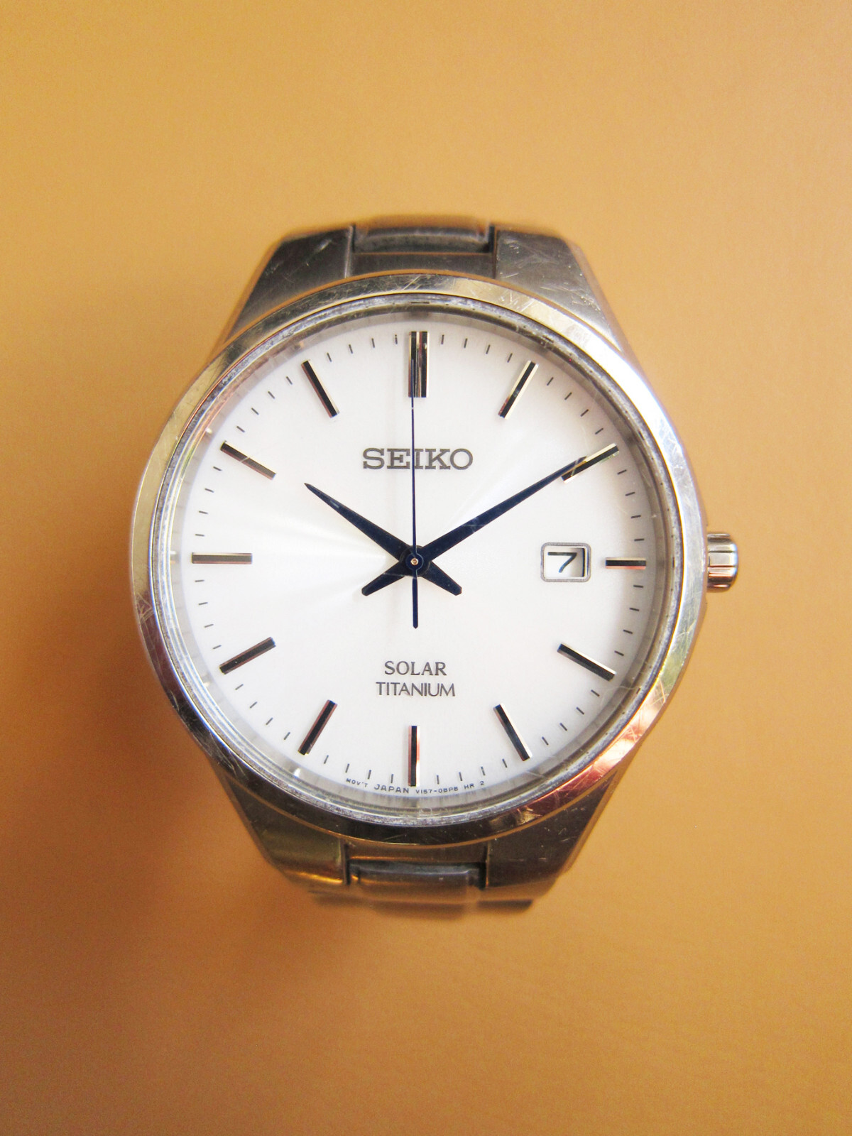 SEIKO V157-0BB0 Full Titanium Solar Menâ€™s Watch w/ White Dial