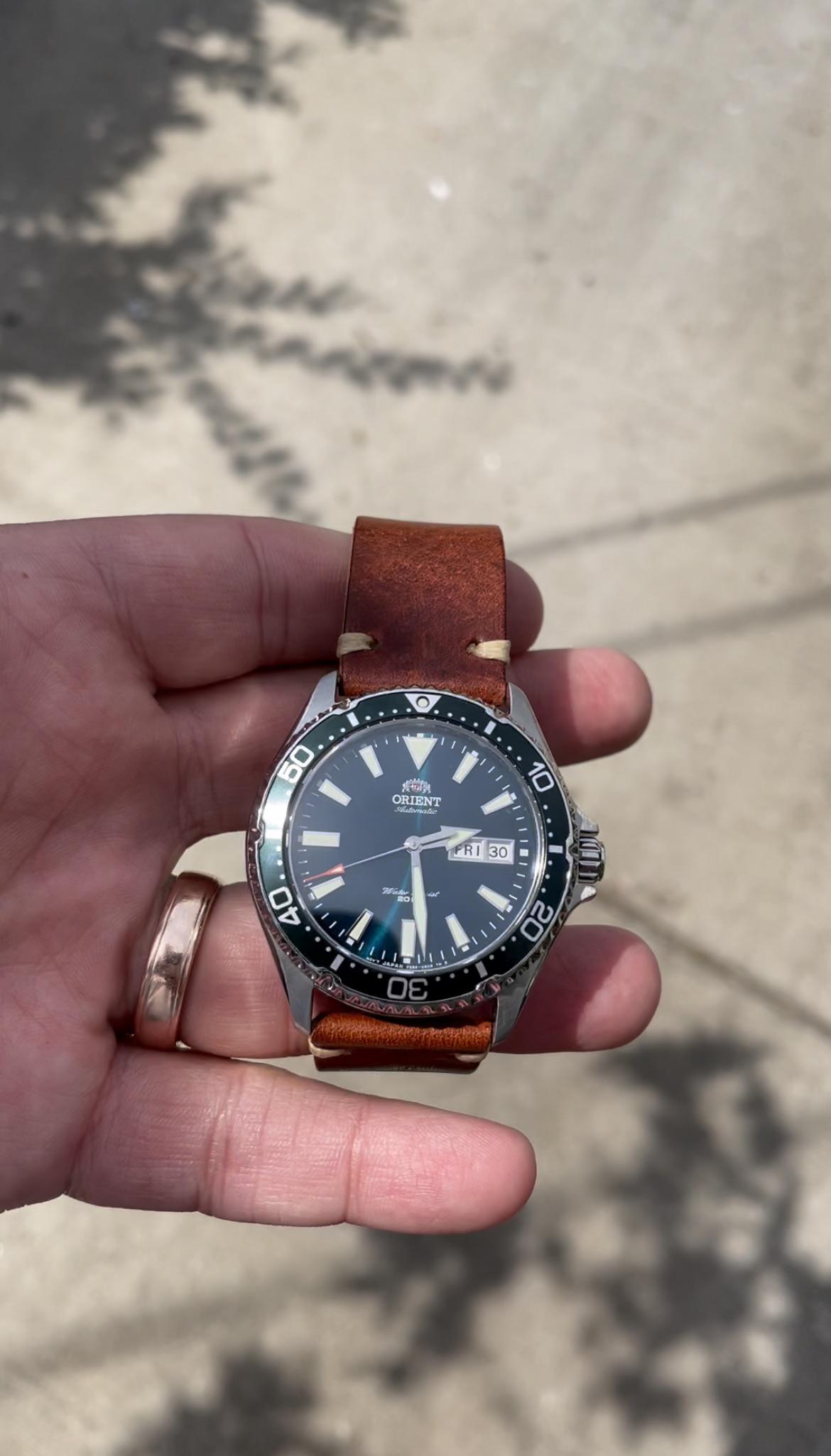 orient kamasu green on wrist