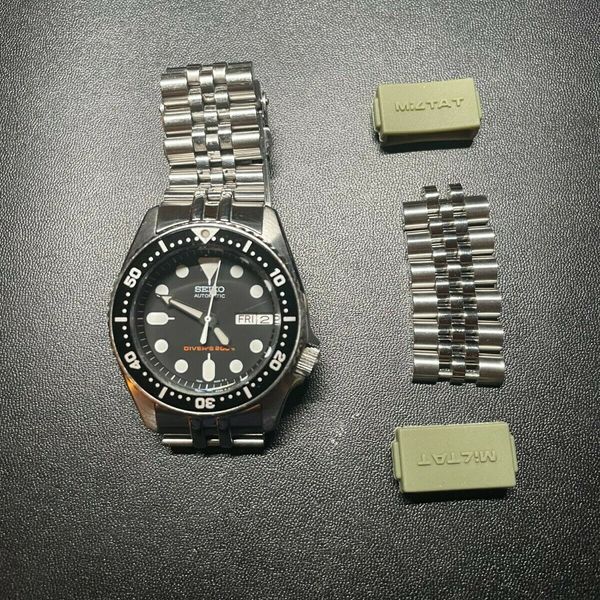 Seiko SKX013 + Strapcode Super Jubilee WatchCharts