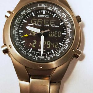 SEIKO H023-00D0 Analog & Digital TITANIUM Chrono Alarm World Time