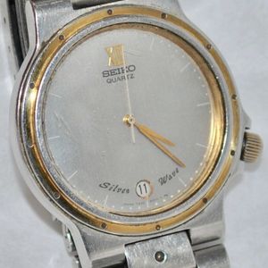 Vintage Seiko Men's Silver Wave 2-Tone Watch Date Function Window 7432-6000  | WatchCharts