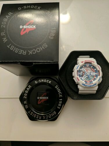 white g shock with blue face
