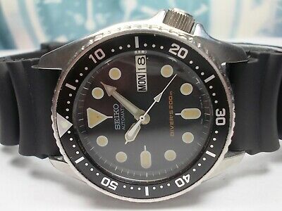 seiko skx013k2 black dial automatic divers midsize watch