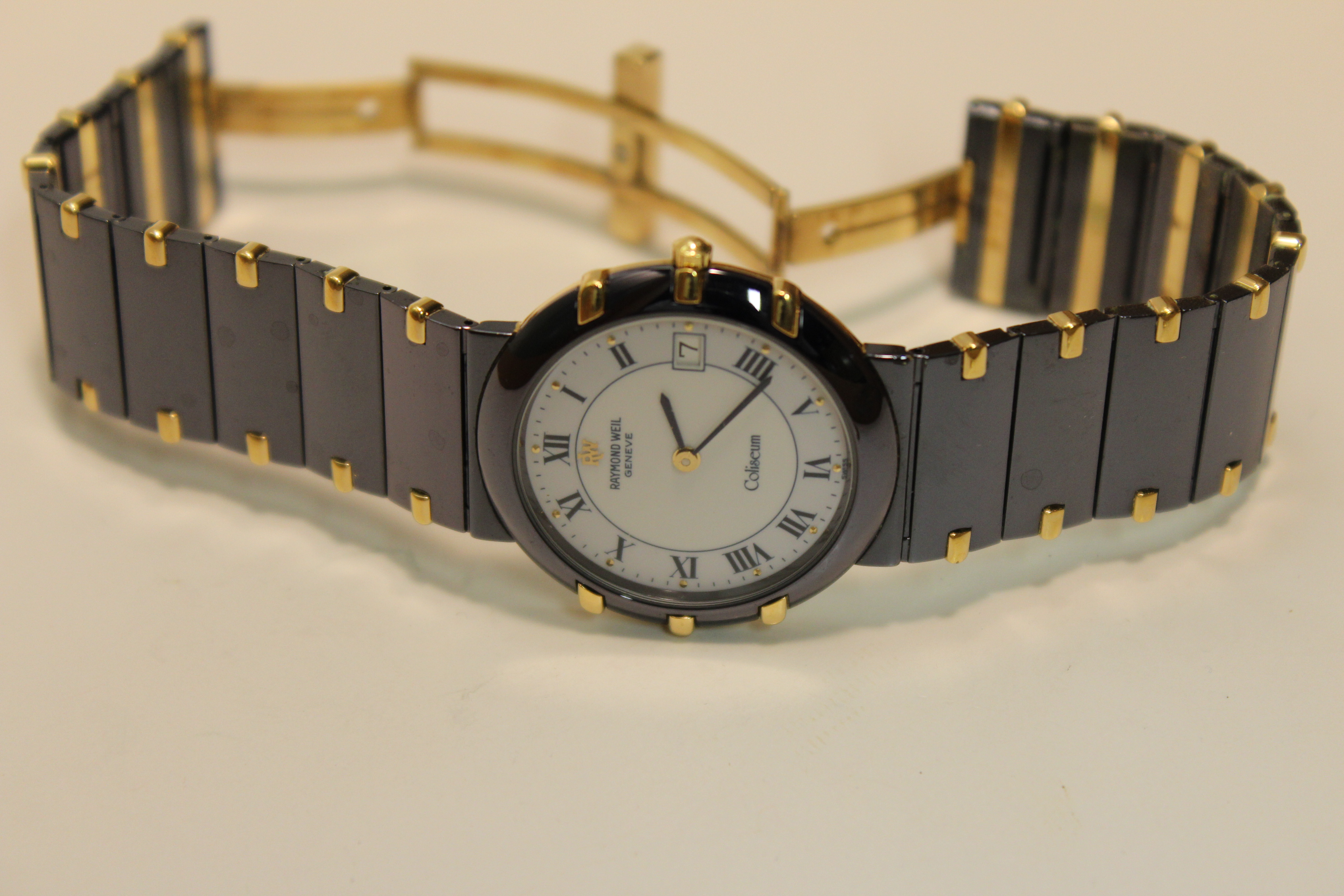 FS Raymond Weil Coliseum Black on 18K Gold WatchCharts