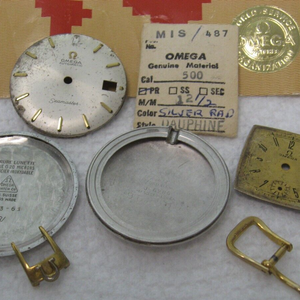 Large lot of Omega new old watch parts of all kind good mix