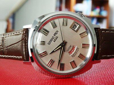 RARE VINTAGE ORIENT GRAND PRIX 100 JEWELS SWIMMER TRIOSTAT