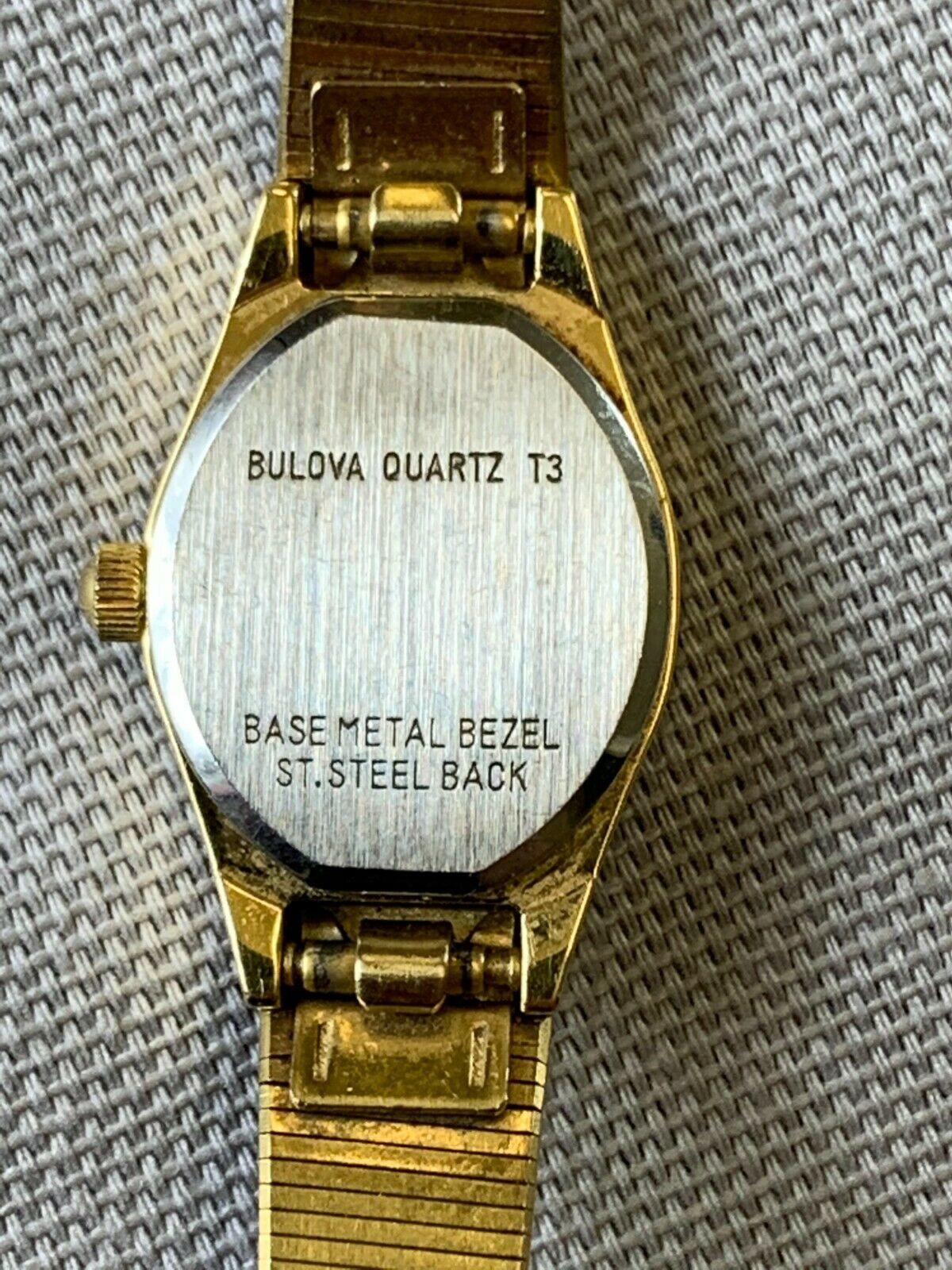 Bulova quartz t3 deals base metal bezel