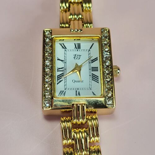 Elizabeth Taylor White Diamonds Gold Tone Rhinestone Watch Womens